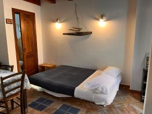 Postel nebo postele na pokoji v ubytování Rustico San Leonardo