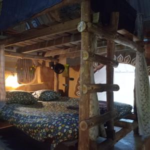 Postel nebo postele na pokoji v ubytování Doendin Mudbrick hostel
