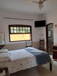 Postel nebo postele na pokoji v ubytování Pousada Astro Rei Paraty