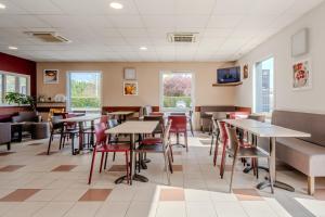 TV a/nebo společenská místnost v ubytování Ace Hotel Noyelles