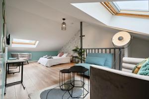 a living room with a couch and a table at Blue Evy in Croix