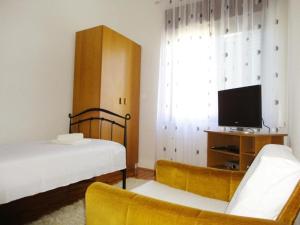 Posteľ alebo postele v izbe v ubytovaní Apartments Bozana