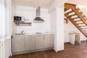 Una cocina o zona de cocina en Senda del Cabrerizo