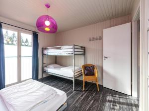 Ένα ή περισσότερα κρεβάτια σε δωμάτιο στο Chalet in Bullingen for 6 Person