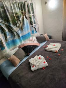 Ένα ή περισσότερα κρεβάτια σε δωμάτιο στο Pitchoun +37 φωτογραφίες