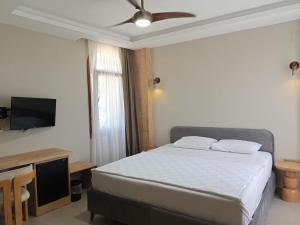 Postel nebo postele na pokoji v ubytování Casalita Hotel
