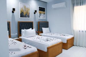 Voodi või voodid majutusasutuse Olivia Hotel toas