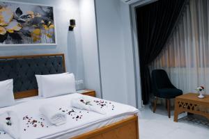 Voodi või voodid majutusasutuse Olivia Hotel toas