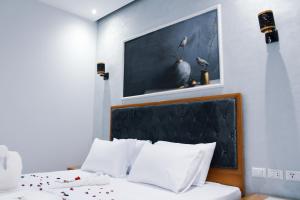 Voodi või voodid majutusasutuse Olivia Hotel toas