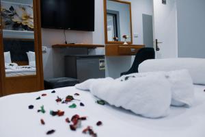 Voodi või voodid majutusasutuse Olivia Hotel toas