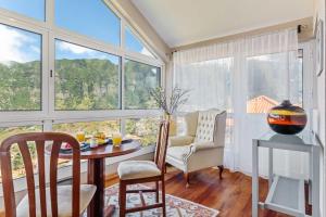 Posezení v ubytování Landure by Homie