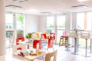 Posezení v ubytování Première Classe Roissy - Aéroport CDG - Le Mesnil-Amelot