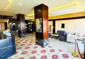 TV a/nebo společenská místnost v ubytování البندقية للخدمات الفندقية BQ HOTEL SUITES