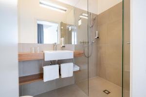 Łazienka w obiekcie Das Jedermann Boutiquehotel mit Stadtgarten