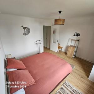 Postel nebo postele na pokoji v ubytování Le Faouët Appartement