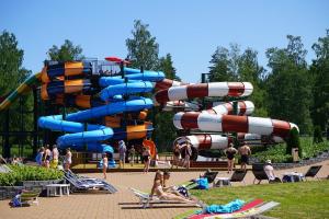 a large water park with a water slide at Kouvola Apartment in Kouvola