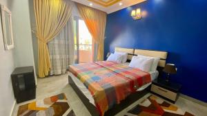 Postel nebo postele na pokoji v ubytování aswan view 3 bedrooms