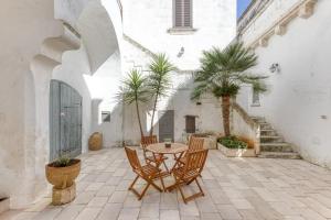 A patio or other outdoor area at La Corte dei Mille