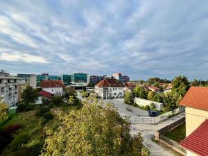 a view of a city with buildings in the background at Apartment Aurora in Buzin