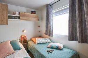 Postel nebo postele na pokoji v ubytování Le Domaine De Mesqueau + 37 fotografií