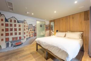 Voodi või voodid majutusasutuse Grassmarket Hotel toas