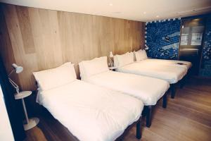 Voodi või voodid majutusasutuse Grassmarket Hotel toas