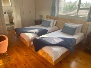 Postel nebo postele na pokoji v ubytování Morrison Hotel