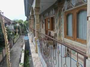 Balkón nebo terasa v ubytování The Reinhold Guesthouse Bali