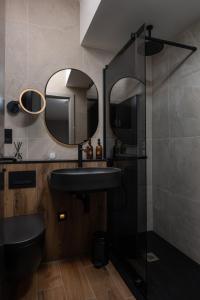 Koupelna v ubytování Montgomery House Apart-Hotel + 37 fotografií