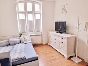 Μια τηλεόραση ή/και κέντρο ψυχαγωγίας στο Urlaub in Hafennähe der Hansestadt Wismar (k)