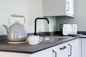 Η κουζίνα ή μικρή κουζίνα στο Cusgarne Manor self-catering - adults only