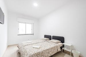 Postel nebo postele na pokoji v ubytování GrowIN Stay Mercado