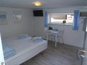 Postel nebo postele na pokoji v ubytování Oddevej 20 Skagen