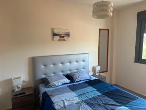Postel nebo postele na pokoji v ubytování Apartamento Mady playa morro de gos