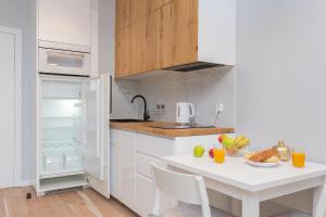 Kuchyň nebo kuchyňský kout v ubytování AVRA Residence III Stare Miasto