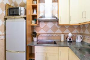 Kuchnia lub aneks kuchenny w obiekcie MARQUES7HOME
