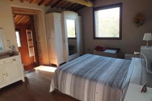 Postel nebo postele na pokoji v ubytování Casetta dell`Uliveto + 37 fotografií