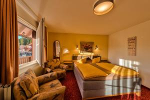 Postel nebo postele na pokoji v ubytování Hotel Sonneneck Titisee -Adults Only-