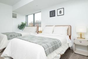 Katil atau katil-katil dalam bilik di Central Space to Balance Life Work Play 7 Sleeps
