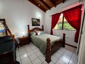 Ένα ή περισσότερα κρεβάτια σε δωμάτιο στο Chalet Belizomi - Le Gardenia Room