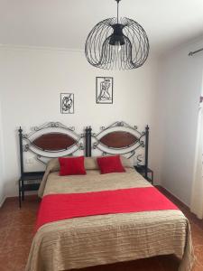 Postel nebo postele na pokoji v ubytování Casa Paraiso