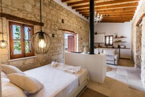 Postel nebo postele na pokoji v ubytování The calopes suites