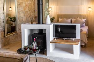 TV a/nebo společenská místnost v ubytování The calopes suites