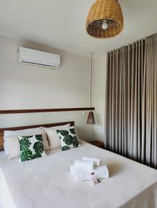 Ένα ή περισσότερα κρεβάτια σε δωμάτιο στο vivant eco beach