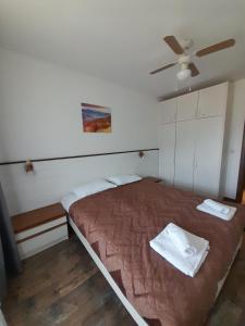 Postel nebo postele na pokoji v ubytování Belvedere Holiday Club H79 + 18 fotografií