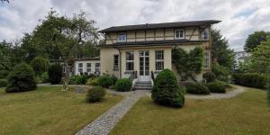 Ein Garten an der Unterkunft Achtern