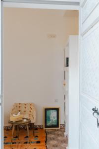 TV a/nebo společenská místnost v ubytování Boutique Hotel La Maison dArts et Medicine + 45 fotografií