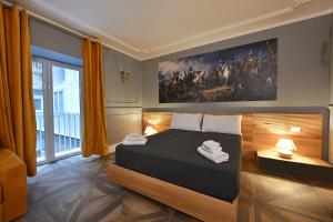 Postel nebo postele na pokoji v ubytování Toledo 424 Suite