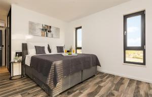a bedroom with a large bed in a room at Villa Lara in Vrana +29 photos