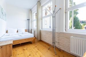 Ein Bett oder Betten in einem Zimmer der Unterkunft Achtern